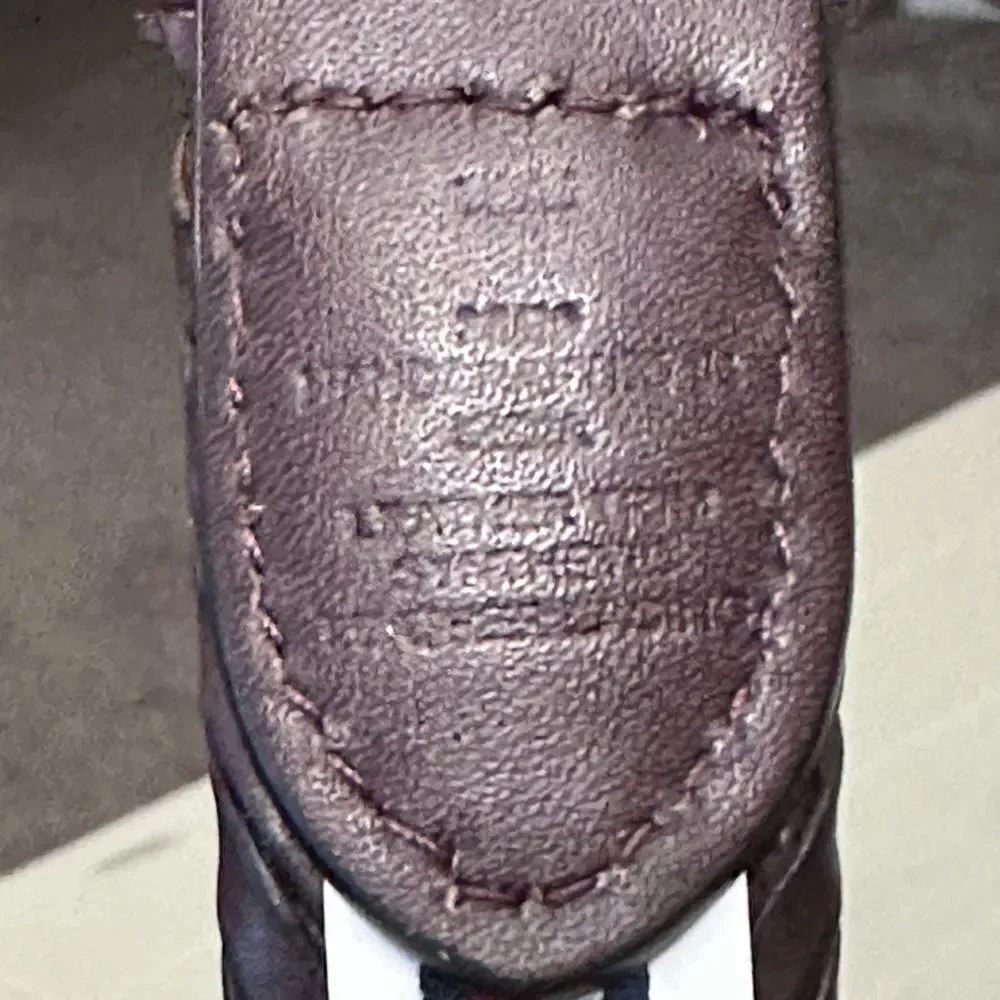 Tommy Hilfiger braided brown leather trim belt. Brass buckle